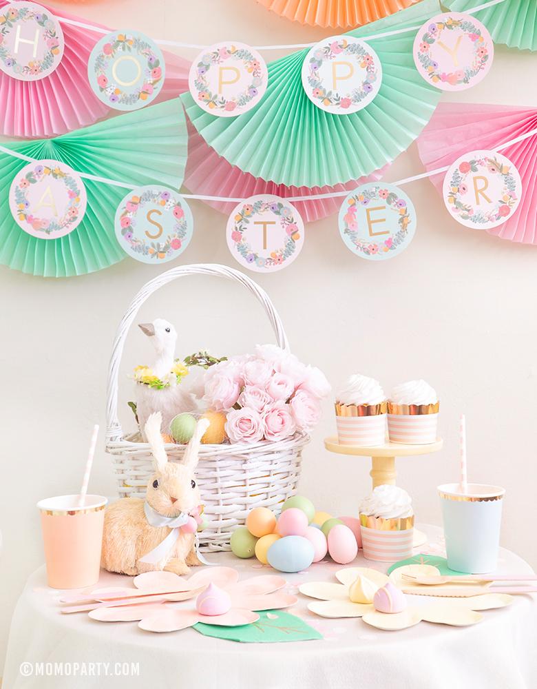 Modern pastel Easter Party celebration idea with Bunting Fan Garlands, Rifle Paper Garden Party Letter Garland, Woodland Bunny Foil Mylar Balloon as decoration, and Pastel Daisy Large Plates, Pastel Cups, Leaf Napkins and Easter Basket for dessert table