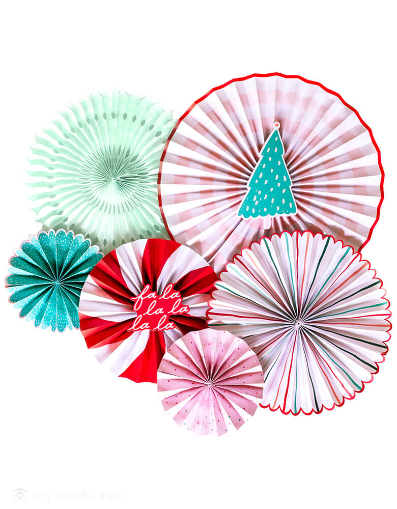 My Mind's Eye - OPC801 - OUI PARTY CHRISTMAS FANS. Set of 6 fans & 2 die cut pieces Size:  1 -17", 1 -14", 1 -14" tissue fan, 1 -11", and 2 -8" fans 1 - 4.5" x 4" Fa la la la chipboard die cut, 1 - 4.5" x 8" Christmas tree chipboard die cut. Make your holidays merry and bright by creating a party display with these paper fans. Hang these rosettes over the goodie table to make it a little more merry, and a place your guests will want to gather.