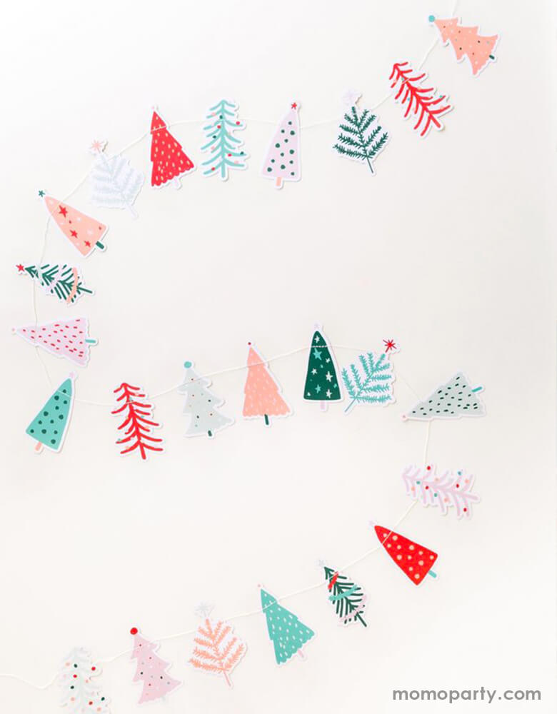 My Minds Eye & Oui Party Collab 6ft Fa La La Christmas Tree Banner in cheery pastel colors spread out on a table
