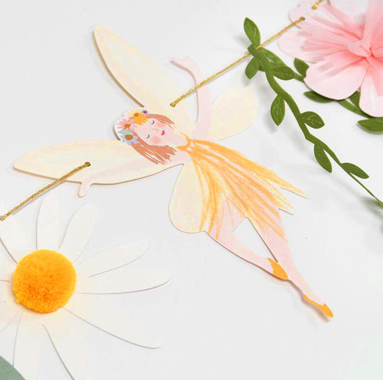 Details of Meri Meri Fairy Garland, A dancing fairy, a daisy flower made by sweet tissue paper tassels and pompoms details,