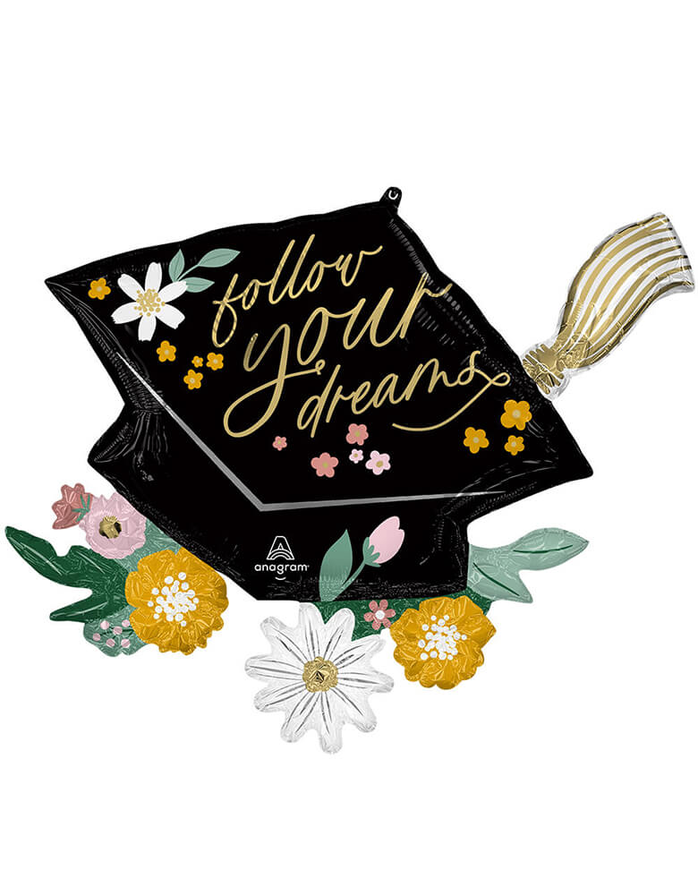 Follow Your Dreams Grad Cap Blooms Foil Mylar Balloon by Anagram Balloons. Featuring a 30 inches Graduation Cap shaped foil balloon with "follow your dreams" gold text with blooming flowers print on it. Add this beautiful graduation cap with pretty blooms foil balloon to your graduation party!