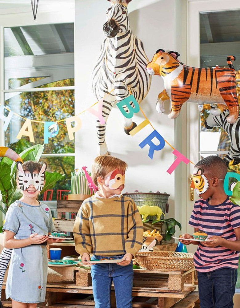 Kids wearAnimals Paper Masks in the Party