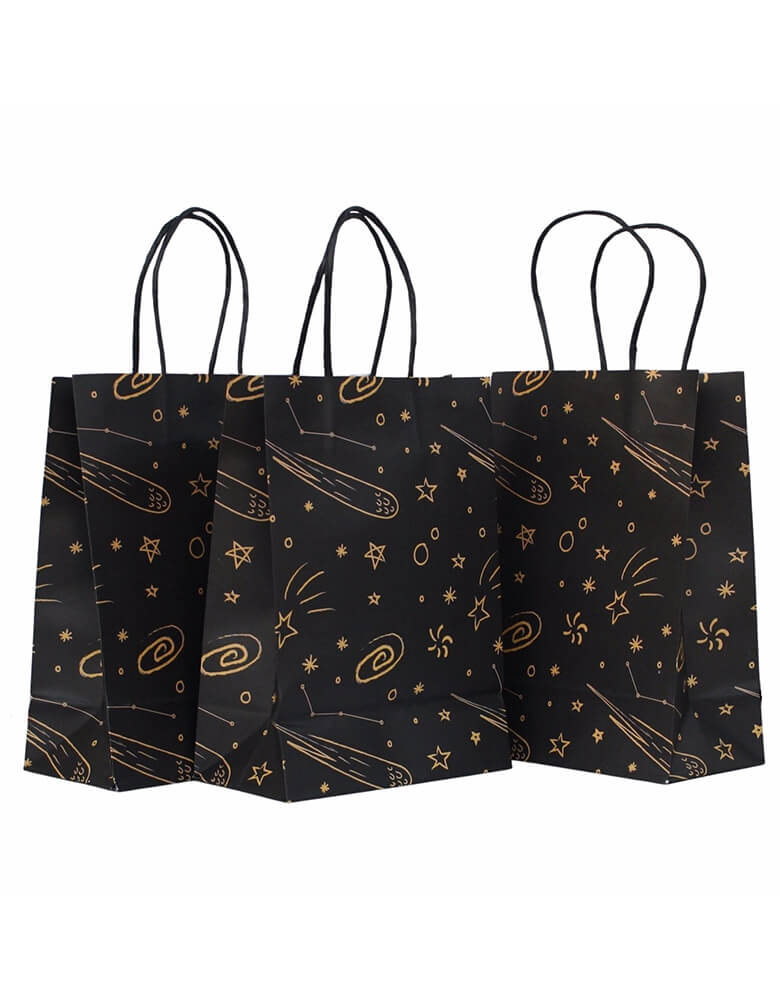 Pooka Party - Galaxy Party Bags. Featuring yellow and dark colors, these planets party bags are inspired on space adventures and are perfect to fill with galactic treats!