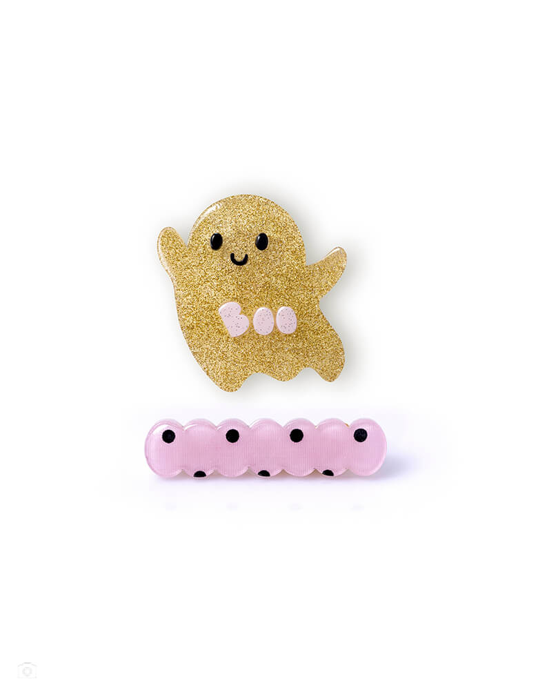 Ghost Glitter Gold + Wave Print Dots Hair Clips by Lilies & Roses NY. This set of glitter hair clips featuring one adorable alligator clip with ghost in gold & a cute pink wave polka-dot alligator clip. They make great Halloween accessories for your little ghoul this season!  It made by 100% acrylic and Made in Brazil