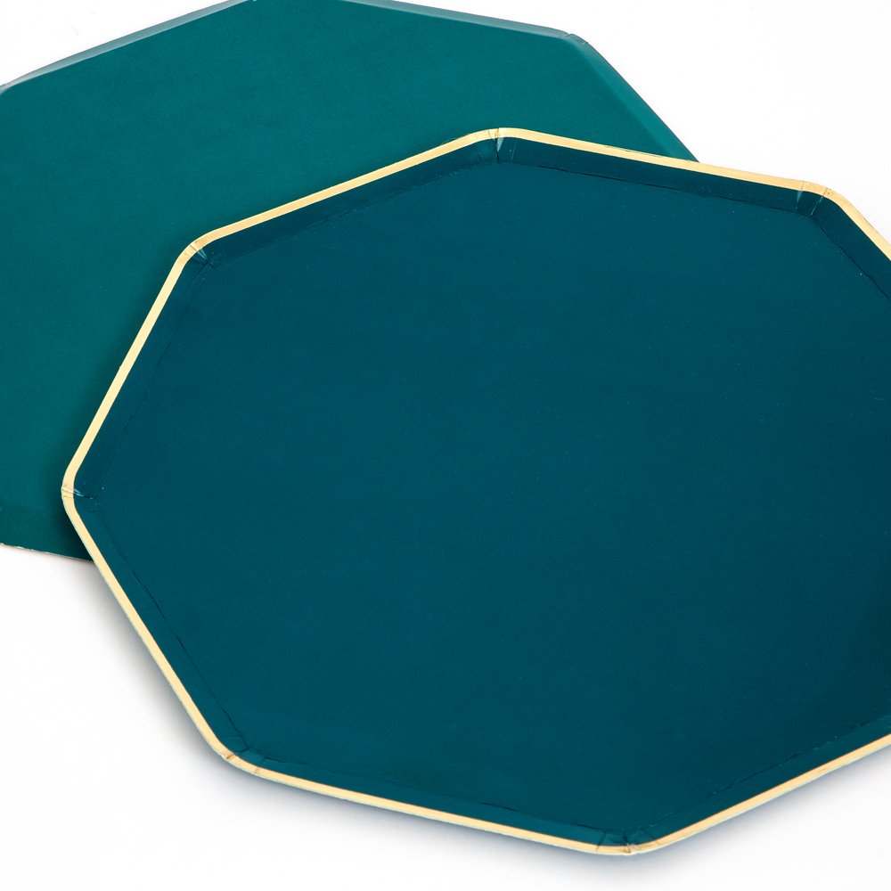 A detailed look of of Dark Teal Side Plates by Meri Meri. These stylish side plates, in a gorgeous dark teal color with shiny gold foil border, are perfect for nibbles or party cake. Made from high-quality card with a superb gloss finish.