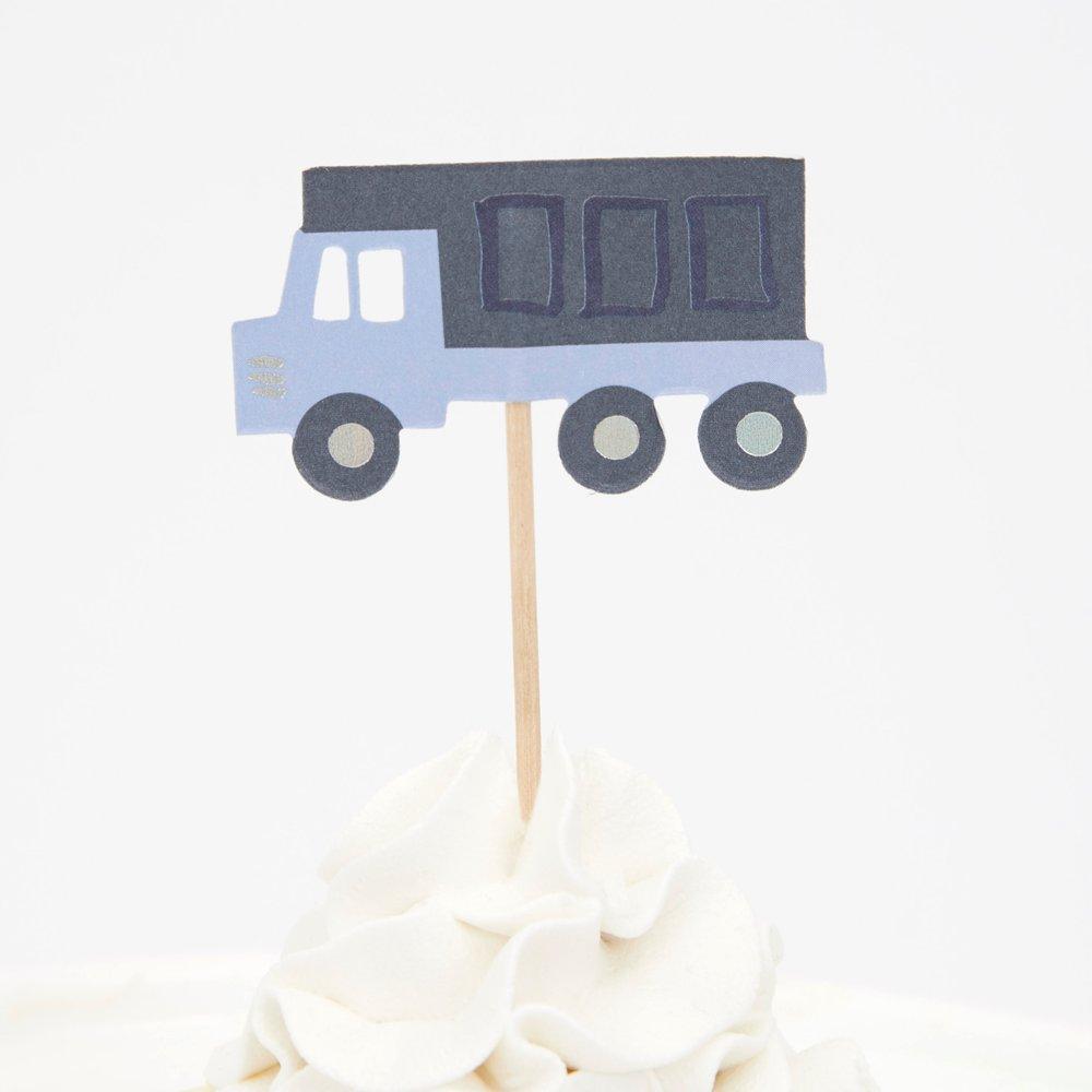 Cupcakes with grey dump truck cupcake topper from Meri Meri Construction Cupcake kit.