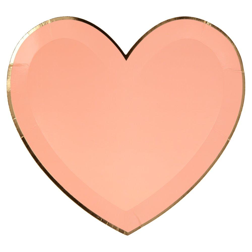 A closeup of the peach plate from Meri Meri's pink tone large die cut heart shaped party plate set in 4 shades of pink including coral, pink, peach and blush with gold foil detail on the edge, perfect for a Valentine's Day or Galentine's Day celebration, wedding, bridal shower, engagement party or any girly themed birthday party.