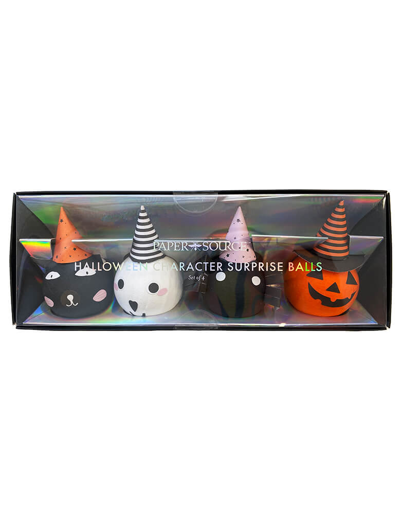 Halloween Character Surprise Balls by Paper Source. Features a cat, ghost, spider and pumpkin with a surprise in each- a glow sticker, squishy toy and spider tattoo. These make a great party favor or decor for your Halloween tabletop.