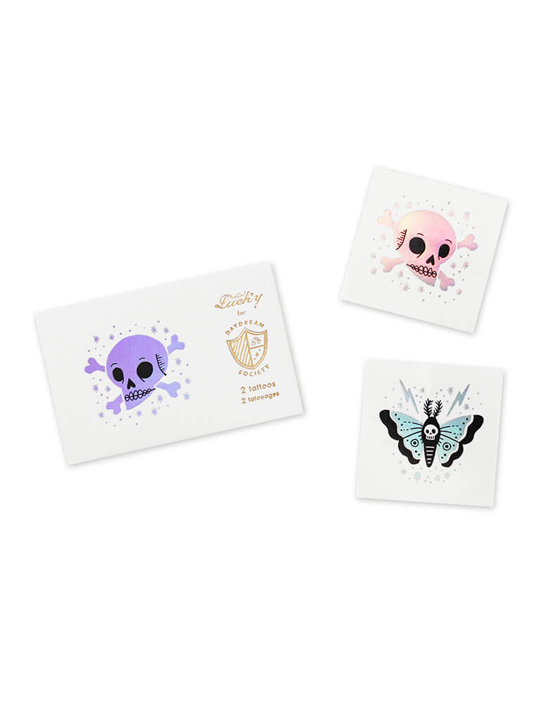 Daydream Society Doomsday Skull Halloween Temporary Tattoos, Featuring holographic silver foil in skull design and butterfly design. illustrated by hello!lucky. Pack of 2, these tattoos are safe and non-toxic, Unique party favor for kids, perfect for a halloween party activity, skull themed party, kids halloween party