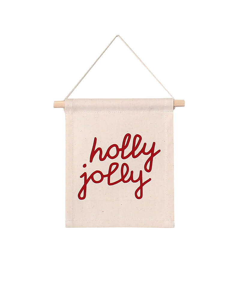 Holly Jolly Hang Sign by Imani Collective. Size:8 x 6.5 inches. This modern Natural canvas with Red screen printing was sewn and screen printed by hand on natural canvas by local artisans in Kenya. It's a perfect holiday decoration for your entrance hall or your little one's playroom, holiday wall decoration! Sold by Momo party store provided modern party supplies, boutique party supplies, chic holiday party supplies and high end party supplies