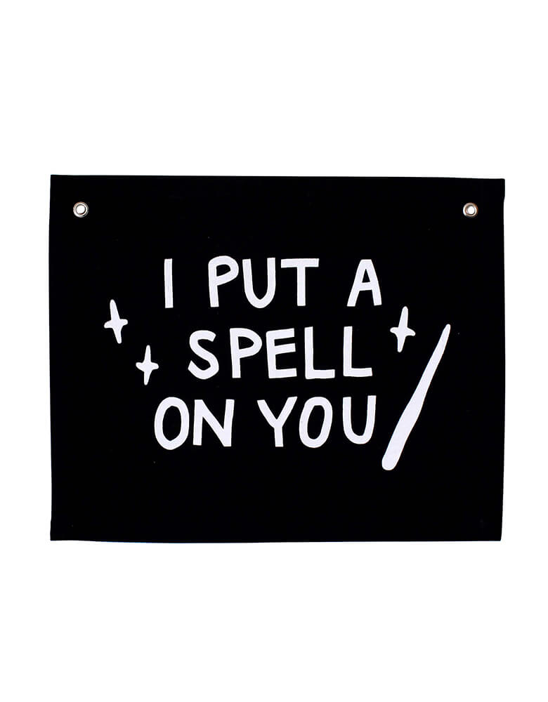 I Put A Spell On You Banner by Imani Collective. size Size: 16 x 20 inches. This modern canvas pennant was sewn and screen printed by hand on natural canvas by local artisans in Kenya. It's a perfect halloween decoration for your entrance hall or your little one's playroom! Sold by Momo party store provided modern party supplies, boutique party supplies, chic holiday party supplies and high end party supplies