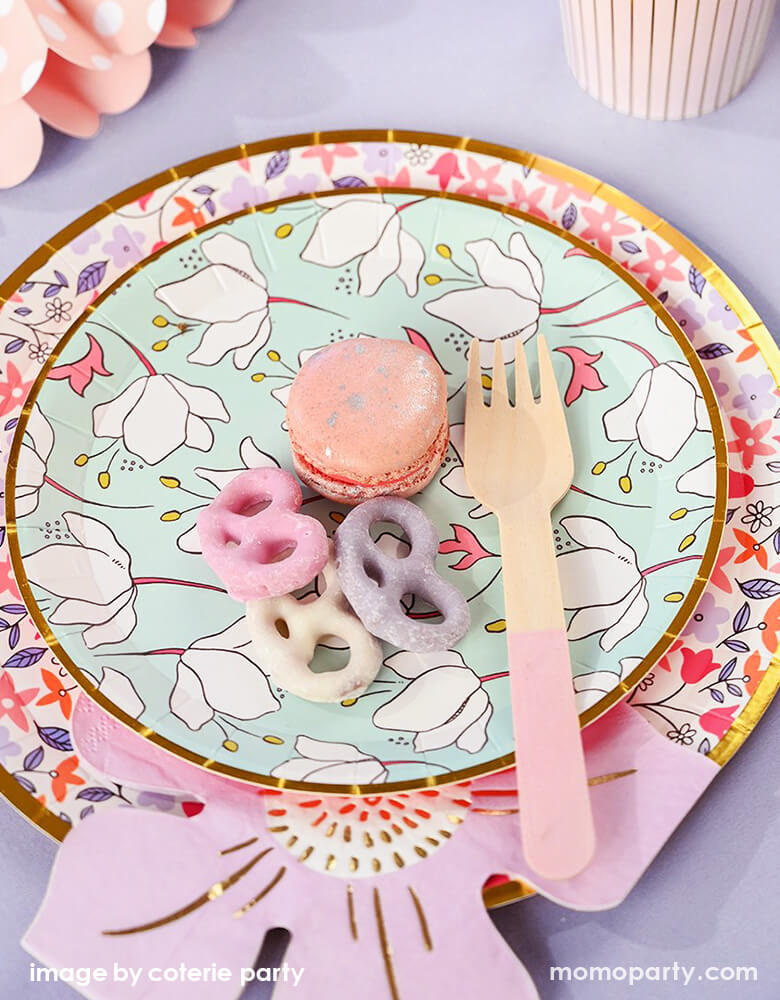 close up look of Floral Garden themed party with desserts and pink wooden cutlery on top of In Full Bloom plates and In Full Bloom flower shaped pink Napkin. This garden-inspired modern design are perfect for spring party, garden themed party, fairy themed party, mother's day, bridal shower, baby shower or any morden parties.
