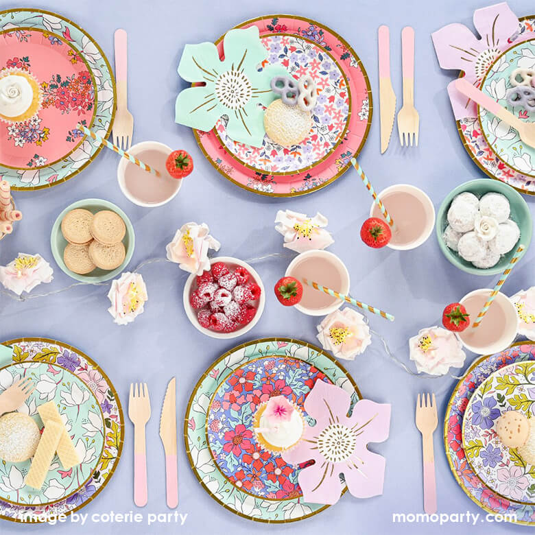 Floral Garden themed party table top decorated with layered Coterie In Full Bloom plates and In Full Bloom flower shaped pink and mint Napkins, drinks with gold foil straws and strawberries, cookies, desserts and fresh roses. This garden-inspired modern design are perfect for spring party, garden themed party, fairy themed party, mother's day, bridal shower, baby shower or any morden parties.