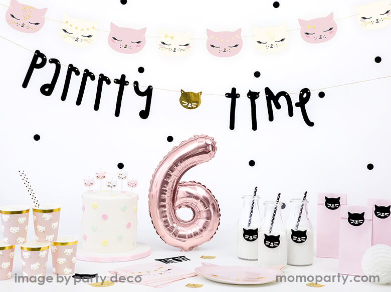 Cat themed birthday party look, decorated with Party Deco Kitty cat garland, Parrrrty time garland, a Rose gold number 6 foil balloon on the table, with a white fondant cake decorated with polka dots and kitty cat candles, party deco cat plates, napkins and cups, pink party paper bags with black cat sticker, mike jar with black cat sticker and black dot straws. They are so cute for a girls birthday, cat lover's birthday, pet themed party