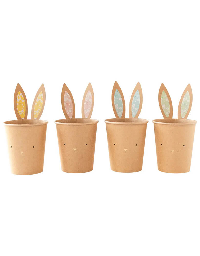 Momo Party's 8 oz kraft bunny cups by My Mind's Eye, come in a set of 8 cups in 4 designs & colors, designed with rustic kraft paper and sweet bunny faces with gold foil accents, these party cups are the perfect addition to your Easter table. Included are attachable ears to make a memorable statement at your table this Easter!