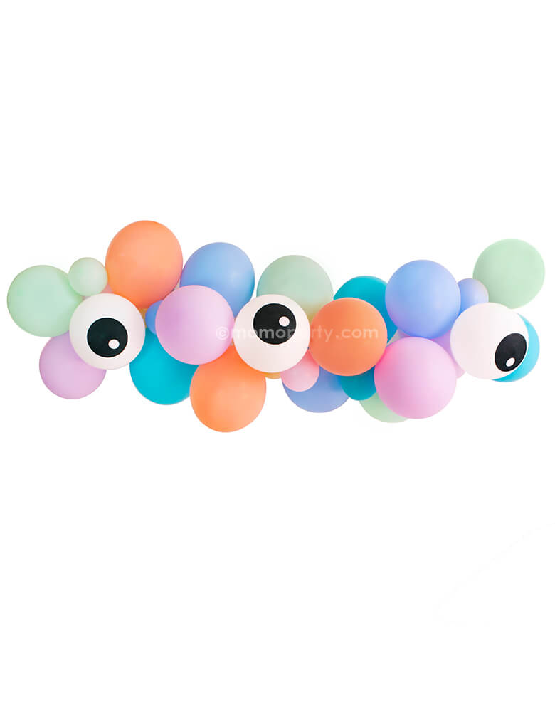 Little Monsters Balloon Garland by Momo Party. Assorted 11” (large) & 5” (small) latex balloons garland kit in Pastel matte mint, Pastel matte purple, coral, pale blue, caribbean blue and eyeball print latex balloons. This colorful and fun design are perfect for a modern halloween themed party, little monsters birthday.