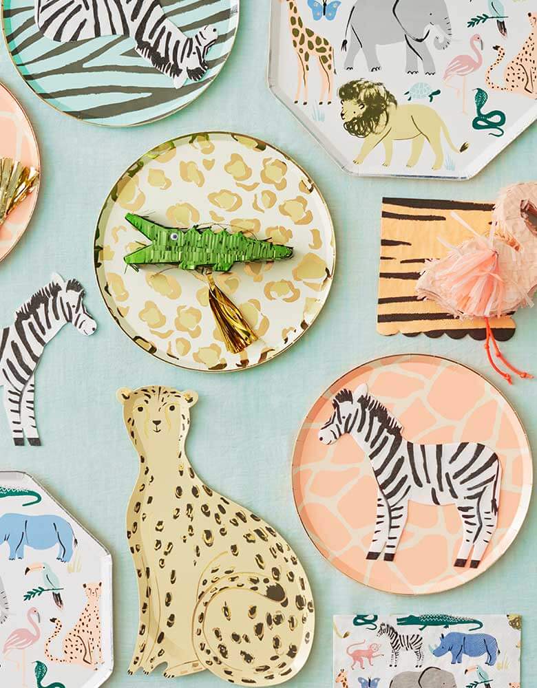 Meri-Meri-Safari-Animal-Collection-Tablescape featuring party plates, napkins in wild animal designs 