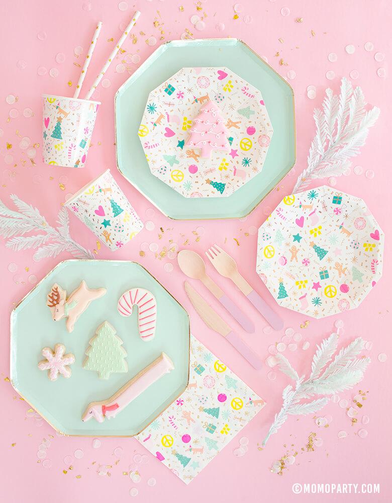 Meri Meri Mint Large Dinner Plates pair with Daydream Society Merry and Bright Holiday Christmas Party Plates,Napkins and Cups, Pink wooden utensils, Christmas themed cookies for a pastel Christmas party celebration
