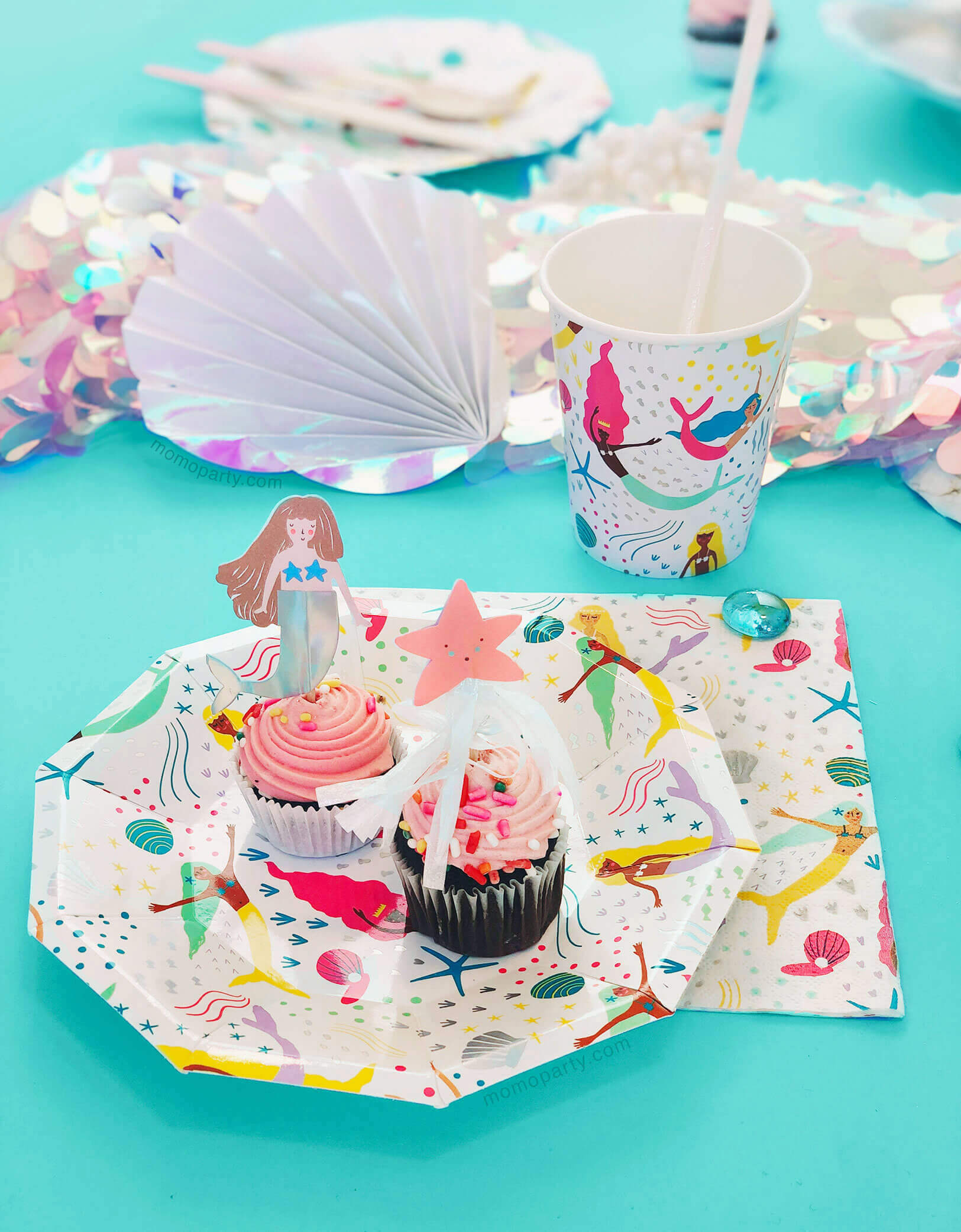 Mermaid Themed Party close up shot with paper Plates, napkins and cups 