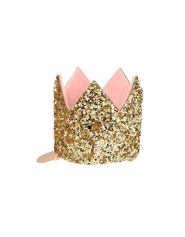 Mini Gold Glitter Crown Hair Clip by Meri meri. Embrace your inner princess by sporting this fantastic gold glitter crown hair clip. featuring Gold glitter fabric with pink felt lining and Gold tone hair clip