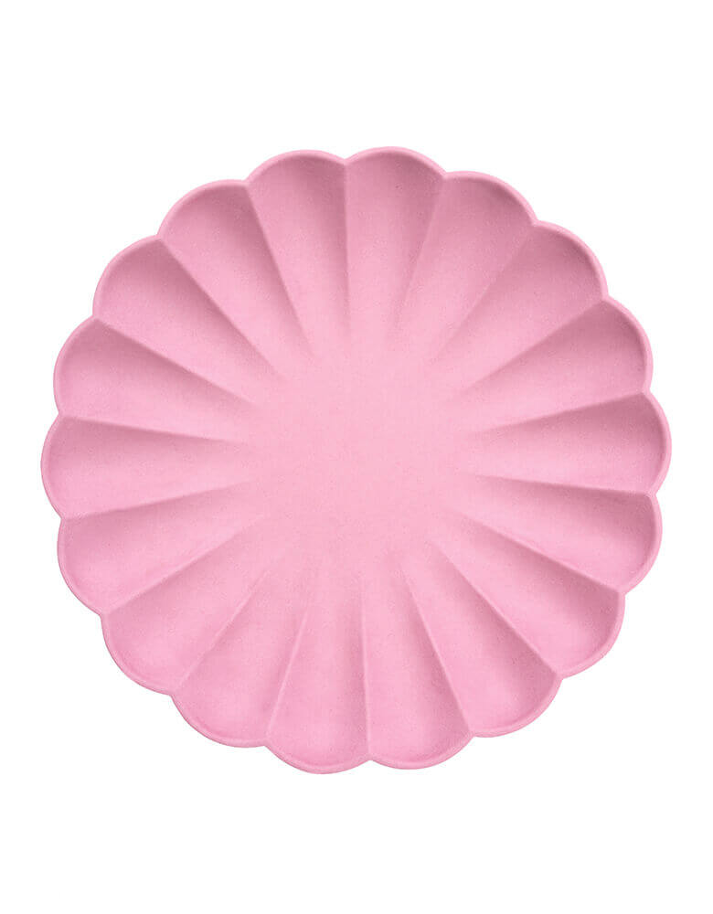 Meri Meri Deep Pink Simply Eco Large Plates. Pack of 8, made from natural materials. Crafted from pulp made from bamboo, wood fiber and sugarcane which is then dyed using water-based inks. They have a beautiful molded design with a stylish scalloped edge.