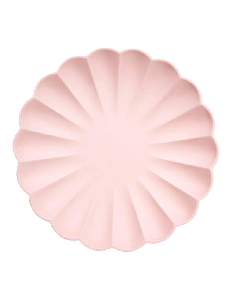 Multi color Simply Eco Large Plates - Pale Pink by Meri Meri . Pack of 8, made from natural materials. Crafted from pulp made from bamboo, wood fiber and sugarcane which is then dyed using water-based inks. They have a beautiful molded design with a stylish scalloped edge.