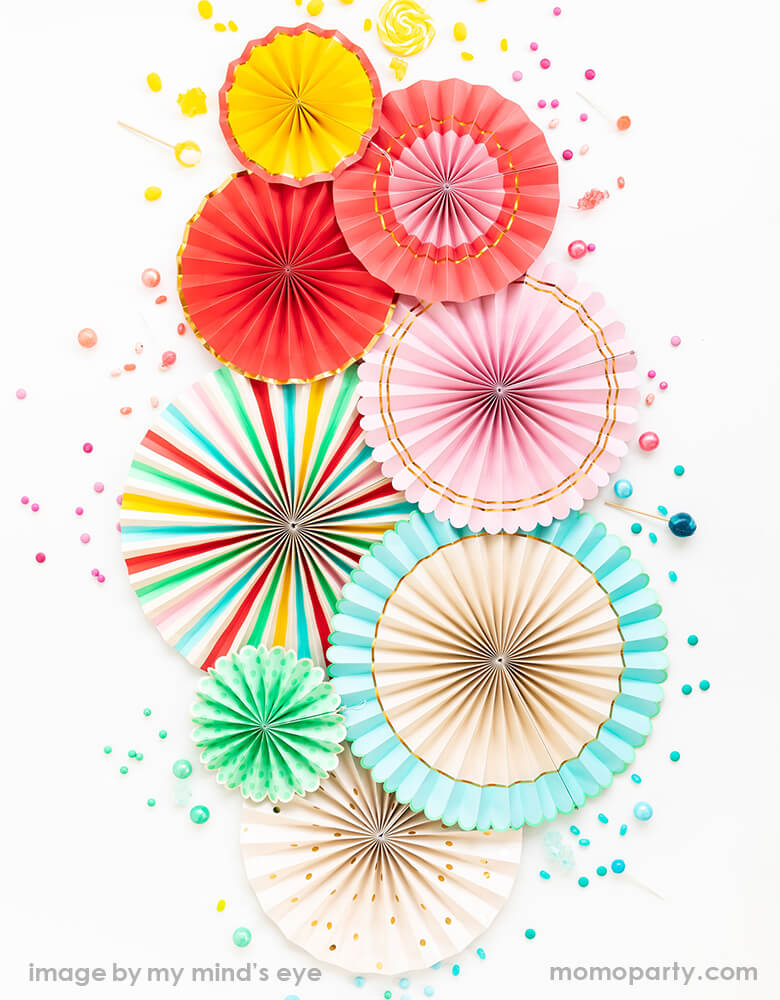 My Minds Eye - Hip Hip Hooray Paper Fans with colorful candy as confetti around the fans. Featuring Set of 8 fans in Double sided and gold foil accents. Create an insta-ready backdrop in a snap with these bright and cheery party fans. Modern and Easy backdrop decoration From summertime ice cream socials to bright birthday bashes these party fans are sure to delight.