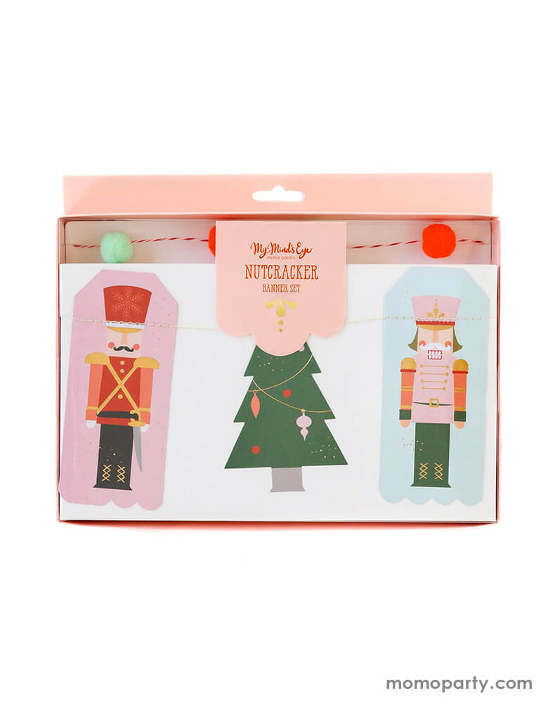 My Mind's Eye - Nutcracker Icon Banner in a clear package. his whimsical banner set is inspired by the Nutcracker, and is sure to bring magic to your holiday this year! The icon banner features characters from this beloved classic with gold foil accents, and the pom pom banner adds dimension to your decor. Hang these banner to create a merry mantel or a festive Christmas treat table for your holiday season.