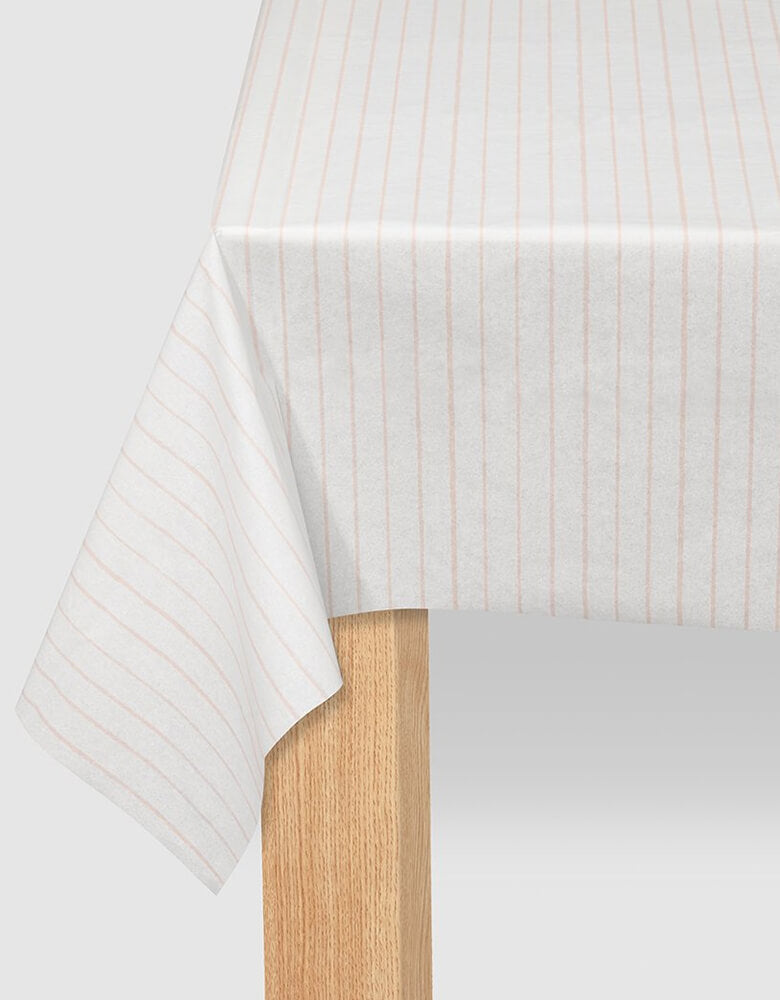 Coterie - Pale Pink Pinstripe Tablecloth. Made from a super soft paper, this modern pale blue pinstripe tablecloth does double duty: protecting surfaces and adding a great design touch to your tablescape. 