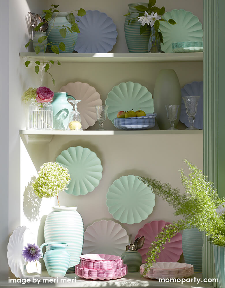 a kitchen pantry decorated with beautiful Meri Meri - Multicolor Simply Eco Plates in Pale Pink, Pale Mint, Pale Blue, and Deep pink colors, and pot with flowers, fruits. These lovely party plates, with a molded shape and stylish scallop edge, not just look amazing. They're also eco-friendly as are made from bamboo, wood fiber and sugarcane pulp, and are dyed with water-based inks.