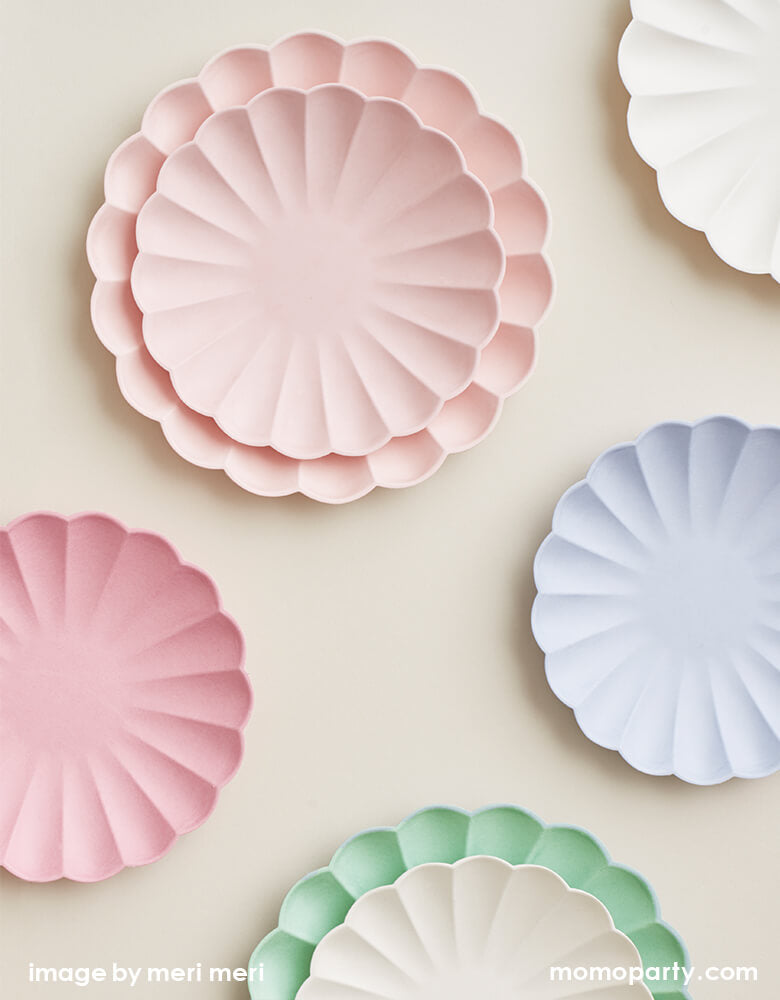Meri Meri Simply Eco Plates, layered in Large and Small plates, in assorted colorful colors in pale pink, pink, cream and green, pale lilac and white. These beautiful plates with a molded shape and stylish scallop edge, will look amazing for your party table. They're also eco-friendly as are made from bamboo, wood fiber and sugarcane pulp, and are dyed with water-based inks. Perfect for tea party, easter party, garden party, baby shower, bridal shower, all type of modern party and celebration