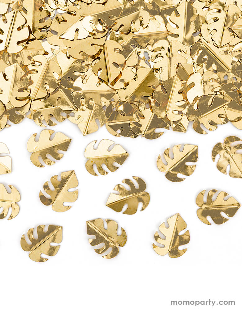 Close up look of Party Deco Palm Leaf Gold Confetti. This confetti features Palm leaf shape cutouts with gold foil. Add some fun to your jungle, dinosaur or tropical themed party by spreading this set of palm leaf confetti in metallic gold to your table! party supply accessories Sold by Momo party store provided modern party supplies, boutique party supplies, chic holiday party supplies and high end party supplies