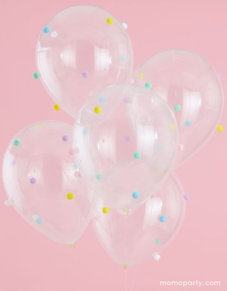Ginger Ray - Pastel Pom Pom Balloon Mix over a pink background. Featuring set of 5 clear latex balloon with Each pack includes 50 pom poms which can be stuck with glue dots included in pack.These fun and eye catching pom pom balloons will be a great addition to any venue and celebration.
