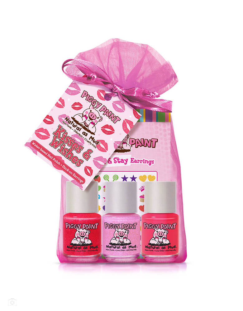  Piggy Paint Nail Polish Gift Set -Kisses + Wishes Gift Set. This cute nail polish set which includes Two 0.25 oz. Nail Polishes (Pom Pom Party and Tickled Pink), one sheet of Wild Child & Stick + Stay earrings Cutie Nail Art stickers all in a Pink Sheer Organza Bags. There are Non-toxic, odorless & safe for all ages. Cruelty-free + Vegan and Made in the USA. These are prefect gift set for kids birthday, and stocking stuffer for holiday. Morden and high quality party boutique online store at momoparty.com