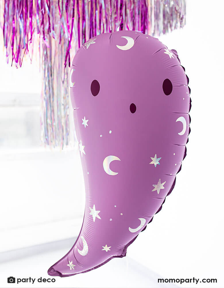 Party Deco 14 inches pink ghost foil balloon featuring iridescent moon and star icons with fringe silver and pink party garlands in the back, perfect for a not-so-scary kid-friendly pink Halloween party
