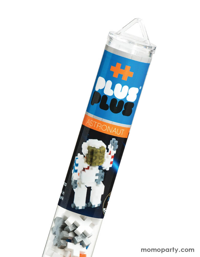 Close up Plus-Plus Astronaut Tube package. This tube contains 70+ pieces and instructions to build an Astronaut. Each piece easily connects to the next and lets your imagination create colorful flat mosaics or work in 3-D to make more intricate builds. Even curves are possible thanks to the unique design of this deceptively simple shape! A perfect STEM toy to develop fine motor skills, focus and patience - as well as design, imagination and creativity! 