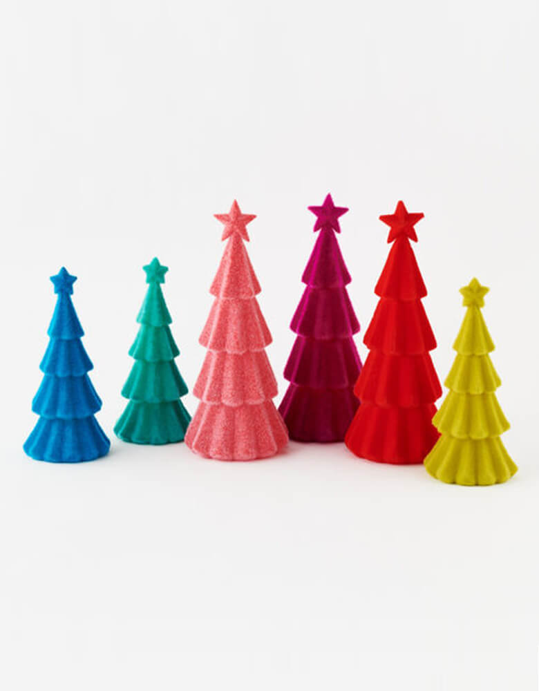 One hundred and eighty 12" and 15" rainbow color flocked Christmas trees in 6 colors including red, pink, lime, teal, blue and fuchsia