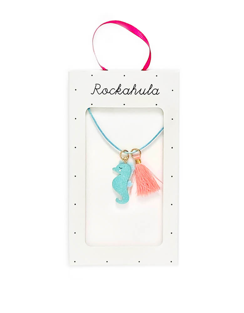 Rockahula Kids - Sylvia Seahorse Necklace. Featuring an adorable glitter seahorse and coral tassel charm, this aqua blue satin rope cord has a lobster claw clasp on an extender chain to ensure the perfect fit. sell in the package with pink ribbon handle, this Pendant Necklace Jewelry is perfect gift for Girls, sea Lover, Gifts for Daughter, easter basket, back to school gift or stocking stuffer gift 