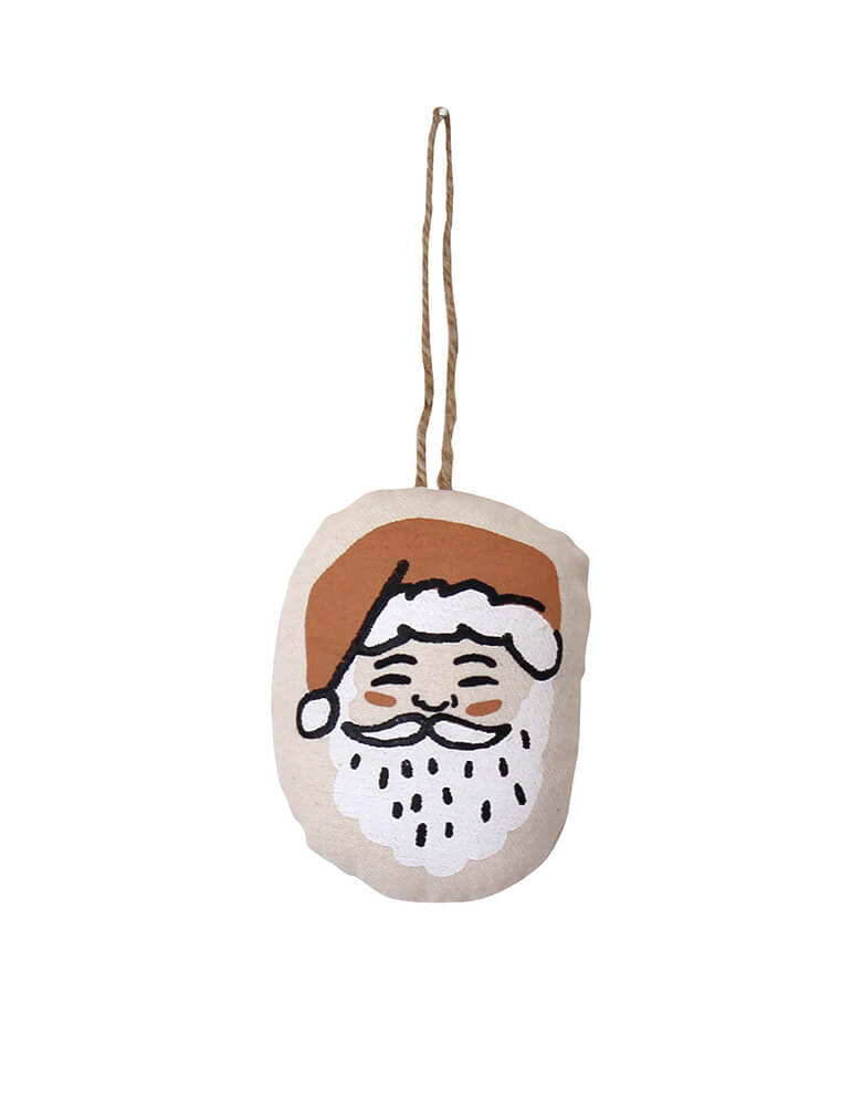 Santa Ornament by Imani Collective. Size: 3 x 4 inches. This modern Plush ornament made with Natural canvas and Santa printing was sewn and screen printed by hand on natural canvas by local artisans in Kenya.  This modern Santa canvas ornament is perfect for this Holiday season, christmas tree decoration, holiday small gift.  Sold by Momo party store provided modern party supplies, boutique party supplies, chic holiday party supplies and high end party supplies