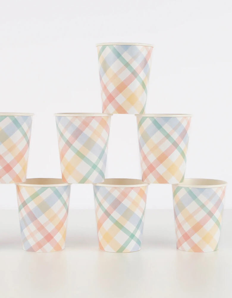 Momo Party's 9oz plaid patterned party cups by Meri Meri. Come in a set of 8 party cups, featuring vintage-inspired plaid designs. They are perfect for any celebration where you want soft muted shades - ideal for baby showers and birthday parties. These plaid patterned cups make a perfect addition to any spring party too!