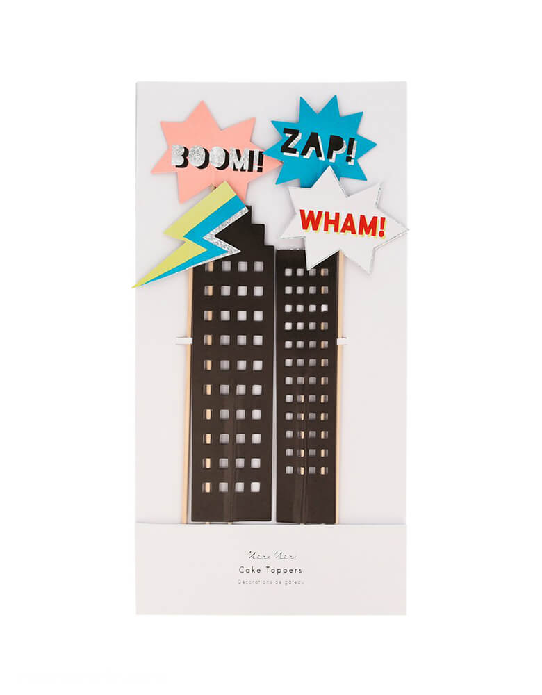 Meri Meri Superhero Cake Toppers. Featuring towering skyscrapers with cut out windows, a lightning bolt, and classic comic book words, "Boom!", "Zap" and "Wham!".