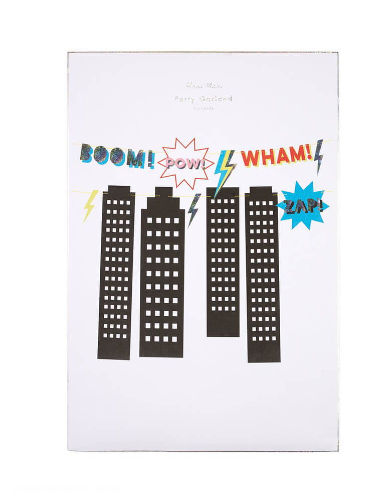 Meri Meri Superhero Party Decoration Garland in the paper package. Featuring bright colors and Sparkly silver holographic foil details of fun statements "Boom!, Pow, Wham! and Zap!", black shadow buildings on the Neon yellow cord for hanging, this 2 Pre-strung garlands will delight your party guests.