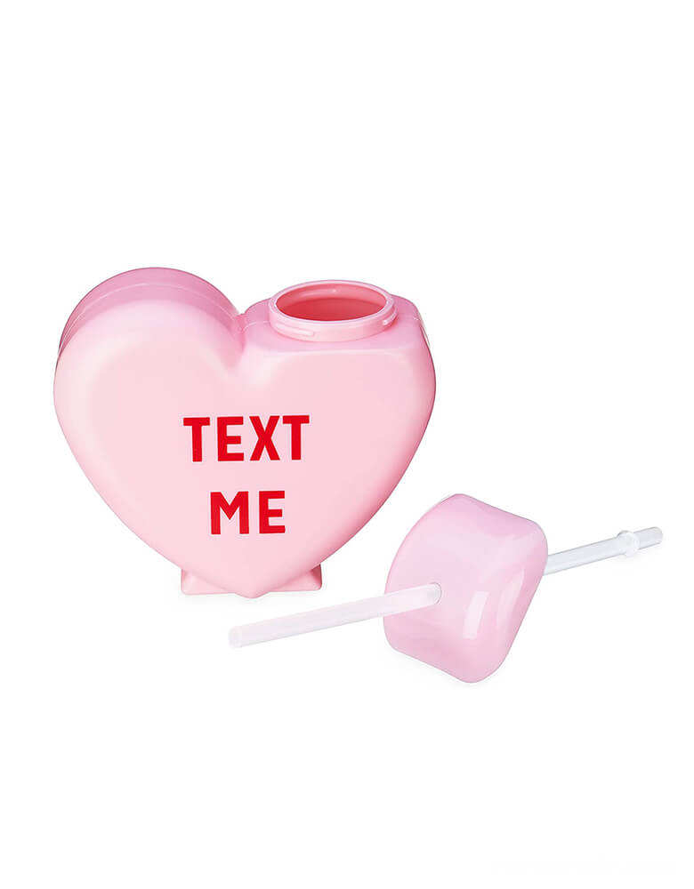 True Brand Blush Sweet-Talker-Conversation-Heart-Tumblers of Pink Tumbler with "Text Me" text, open bottle with a straw. This reusable tumbler is so cute and fun perfect for your Valentine's Day or Galentine's Day gatherings