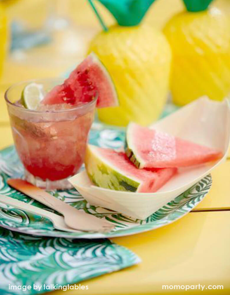 Tropical Fiesta Party with Talking Tables  Tropical Fiesta Palm Leaf plates and Small Napkins, wooden cutlery, watermelon slides and watermelon drink for a fresh summer party