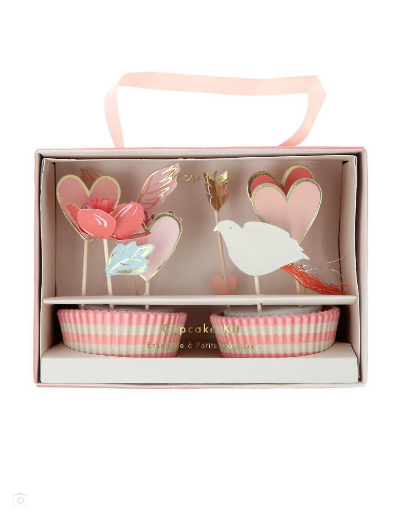 Meri Meri Valentine Cupcake Kit (set of 24 toppers). This set of Valentine Cupcake toppers include 8 love hearts in different colors, 4 flowers with tissue papers centers , 4 birds with glittering tassel tails, 4 arrows with Gold foil details and 4 “Love” with wings, and Striped shades of pink make the cases. Packaging using eco-friendly paper with pink ribbon handle made. they'll look amazing on display and will be the highlight of your Valentine's Day party.