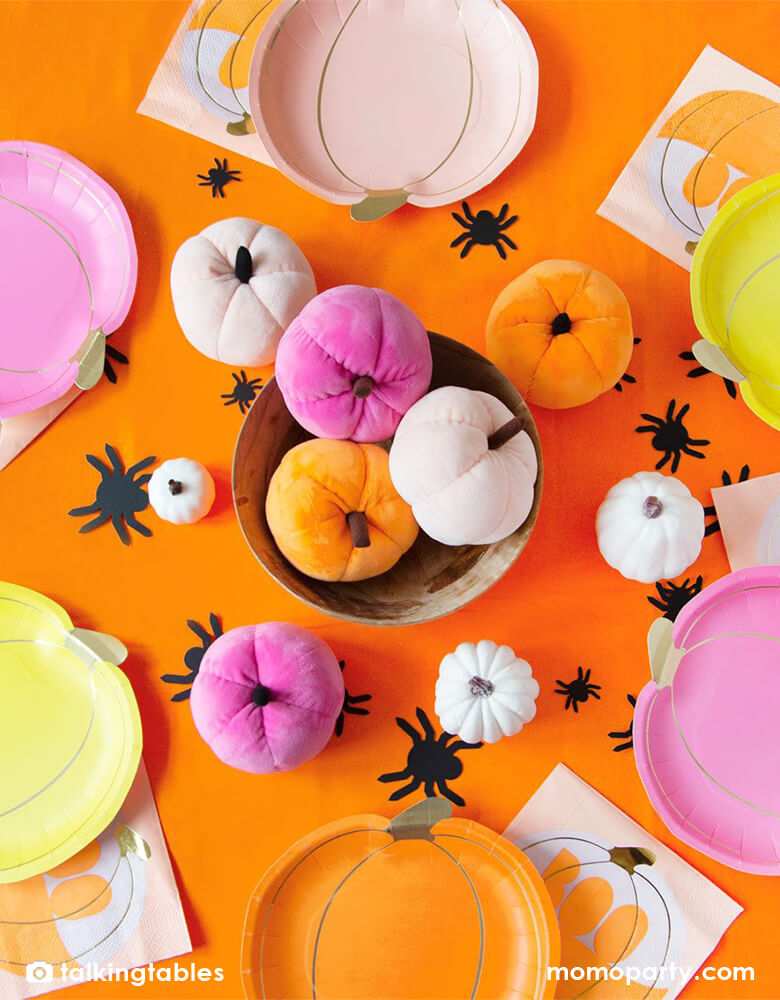 Talking Tables - Velvet Pumpkin Table Decoration, in light pink, hot pink and orange colors in the middle of the halloween table, with neon pumpkin plates, pumpkin boo napkins, spider decoration around. These adorable fabric pumpkins are the perfect table decoration to add a pop of color to your Halloween Party, Thanksgiving table or Autumn tablescape.