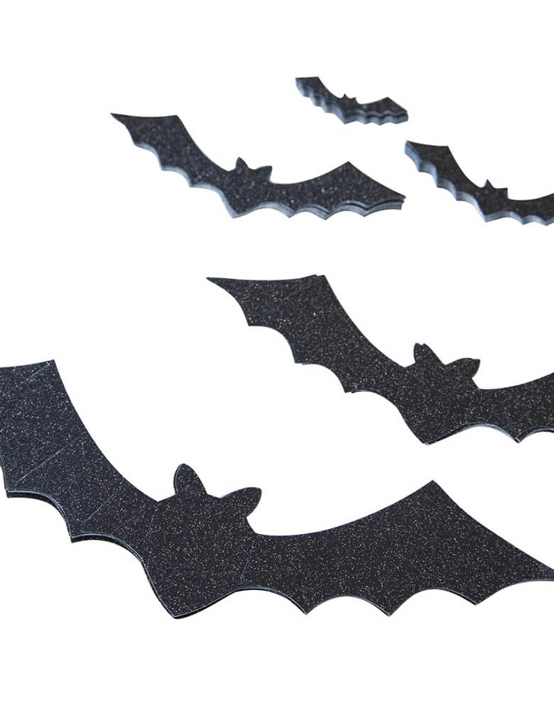 My Mind's eye glitter bats With score lines, these bats become dimensional and are ready to take fly at a moments notice, creating a truly terrifying space this Halloween. 