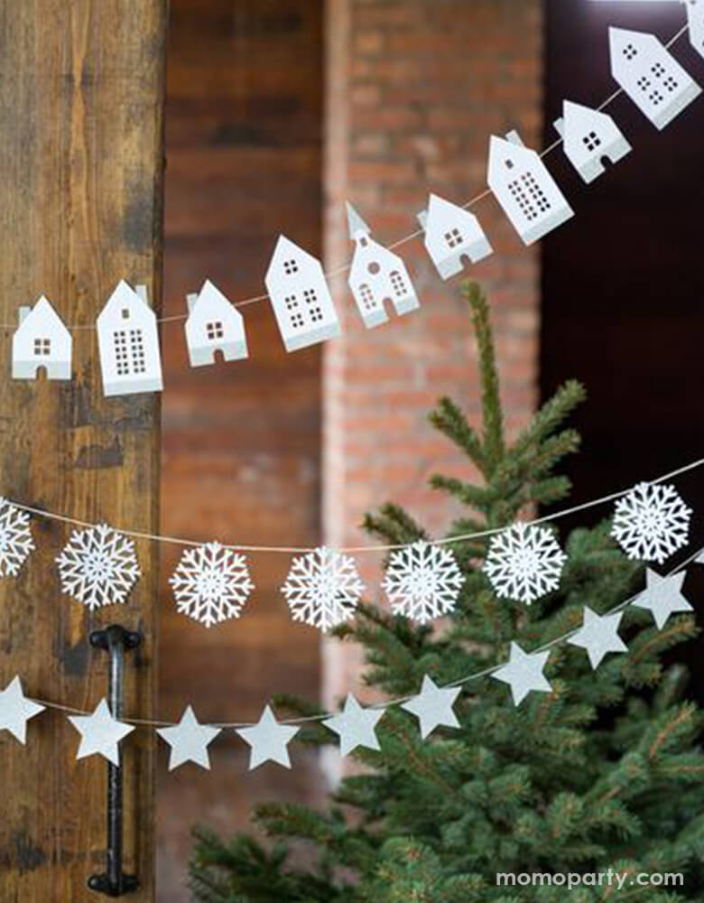 Winter White Christmas holiday sweet home decoration with My minds eyes' White Glitter Stars Banner and winter white house banner and classic snowflake banner in front of a christmas tree and rusty barn door for a white winter holiday celebration