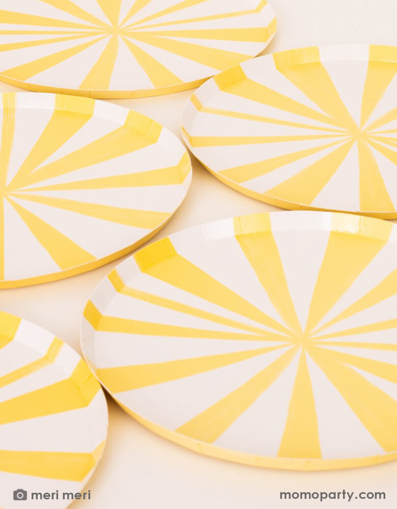 A detail look of Yellow Stripe side Plates by Meri Meri. These sensational round side plates featuring yellow and white striped design. Stripes are a delightful way to add lots of color and style to any party table.