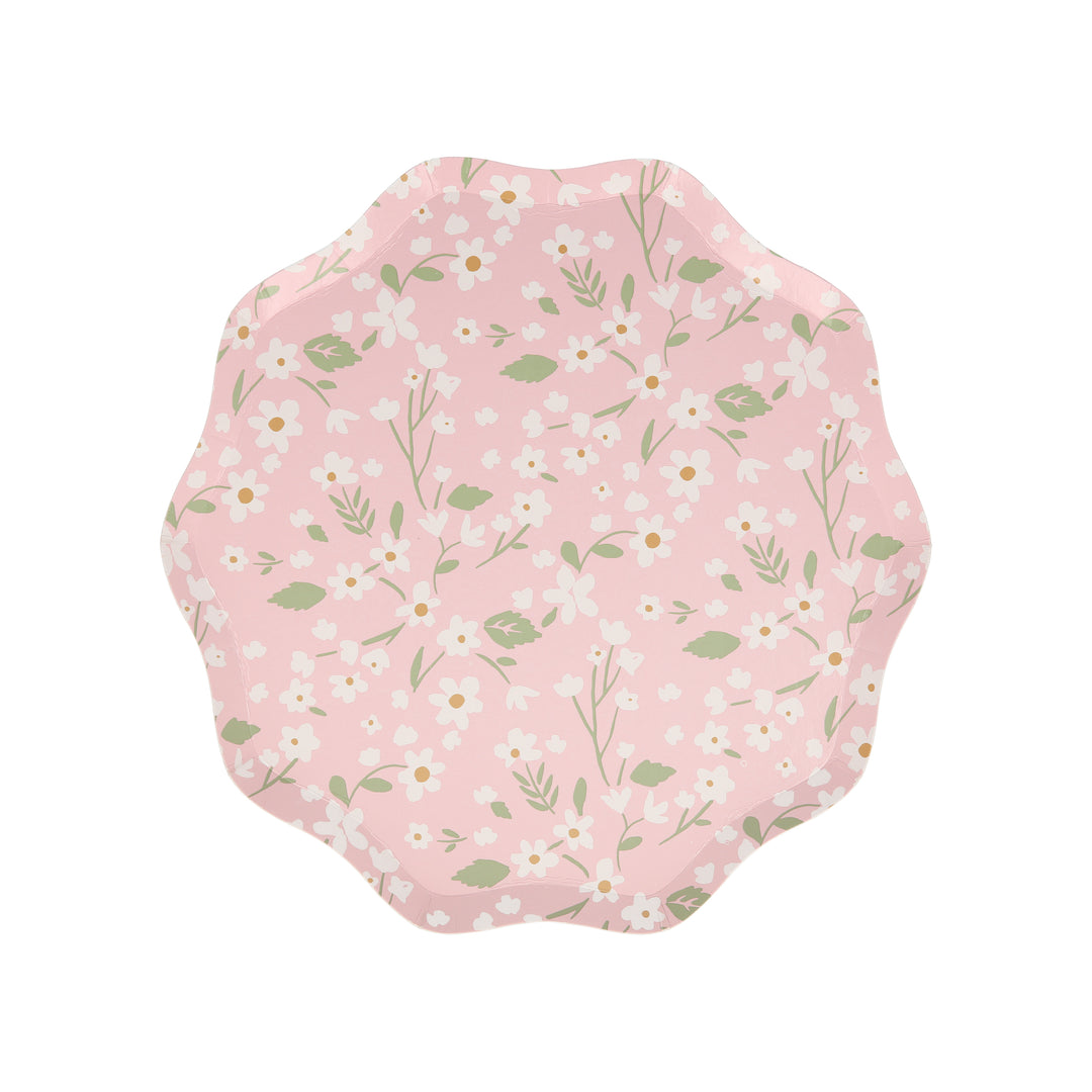 Ditsy Floral Side Plates By Meri Meri. Features a fabulous floral pattern with a stylish scalloped edged in pink color designed paper plates. Made from eco-friendly paper.  Add a touch of springtime beauty to your party table with these high quality, well designed party plates.